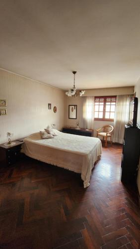 Tempat tidur dalam kamar di El Depa de la Abuela