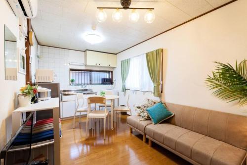 Χώρος καθιστικού στο ジブリ美術館徒歩10分　三鷹駅近　最大５名　暮らすように泊まる【MITAKA WOOD ROOM】