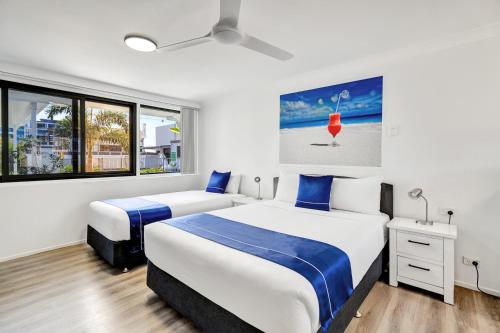 Postel nebo postele na pokoji v ubytování Montego Mermaid Beach Motel