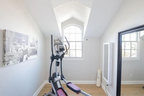 a room with a exercise bike in the corner of a room at 4221 Urban oasis in Hillcrest Mission Hills in San Diego