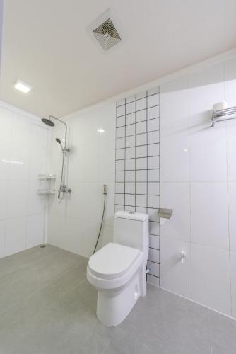 Ванная комната в Kamadhoo Inn