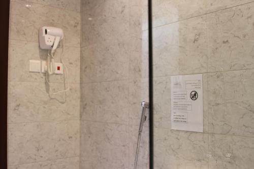 Koupelna v ubytování Carawan Al Khaleej Hotel Olaya