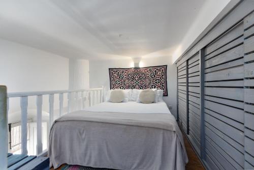 Posteľ alebo postele v izbe v ubytovaní Apartamento con alma vintage en el Casco Antiguo