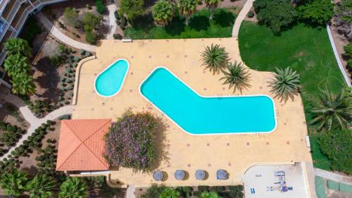 an aerial view of a resort with a swimming pool at Sol & Lar No stress in Santa Maria