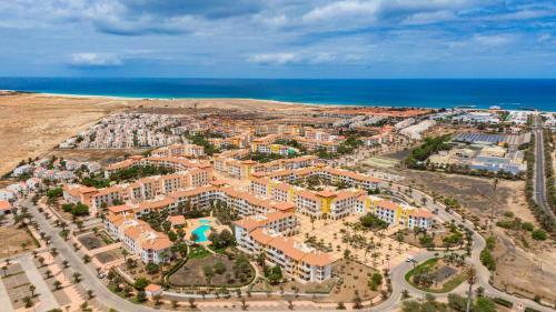 an aerial view of a resort near the ocean at Sol & Lar No stress in Santa Maria