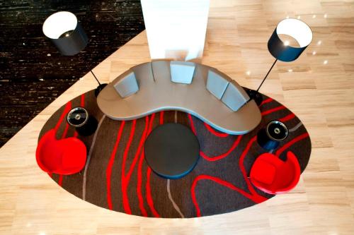 a table with a mouse on top of a floor at Le Méridien Qingdao l Instagrammable l CBD l Nearby seaside,nearby May 4th Square in Qingdao