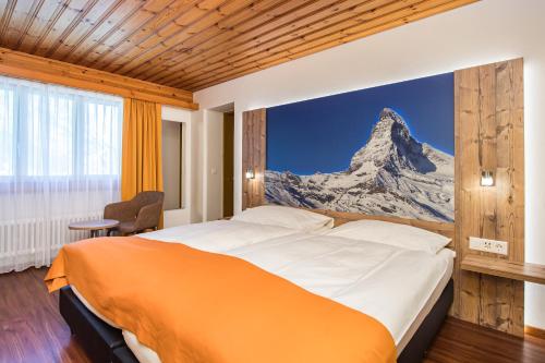 Postel nebo postele na pokoji v ubytování Hotel Taescherhof