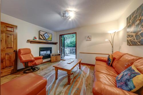 a living room with a couch and a chair at Northern Lights 21 in Whistler