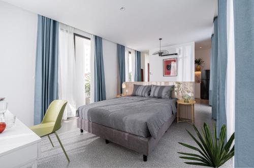 Ένα ή περισσότερα κρεβάτια σε δωμάτιο στο Express by M Village Điện Biên Phủ Q3