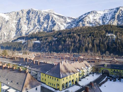 an aerial view of a town in front of a mountain at Hilltop Apartment in Eisenerz with Garden in Eisenerz