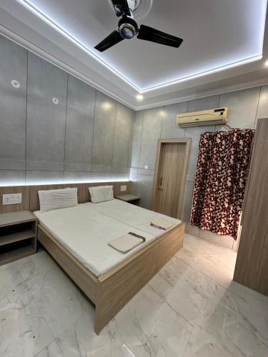 Postel nebo postele na pokoji v ubytování Hotel Garg
