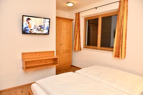TV/trung tâm giải trí tại Appartements neben der Gondelbahn - Haus Nord