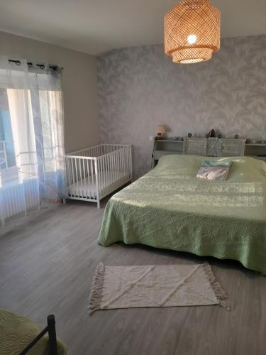 Postel nebo postele na pokoji v ubytování Gîte du capitaine
