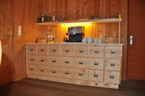 a room with a bunch of drawers in a kitchen at Villa Natur in Schröcken
