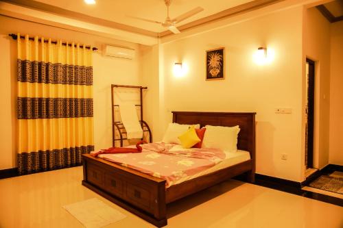 a bedroom with a bed in a room at Villa71 in Galle