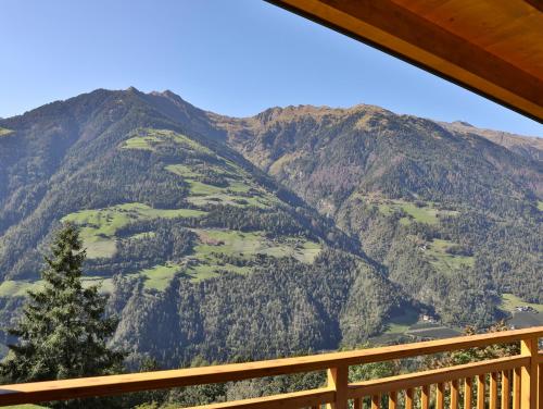 a view of a mountain from the balcony of a cabin at Natur Residence Kaiser Hans in Schenna