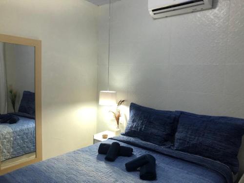 Ein Bett oder Betten in einem Zimmer der Unterkunft Casa Completa Prox Centro de Pipa