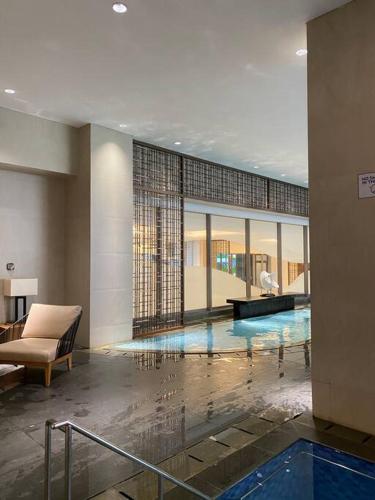 Πισίνα στο ή κοντά στο 1BR The Charming Branz by lalerooms CLOSE TO ICE find us on ig lalerooms