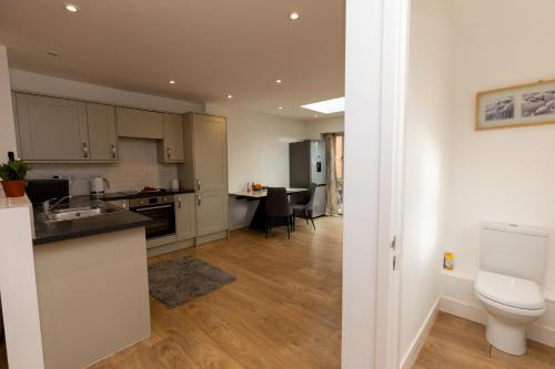 Et badeværelse på The Poppies Cottage