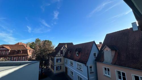a view of a group of buildings from a balcony at Goldener Schwan Hotel Garni in Bad Windsheim