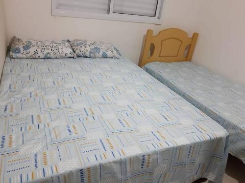 Postel nebo postele na pokoji v ubytování Apartamento Em Balneário Mogiano