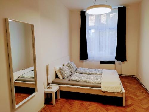 Postel nebo postele na pokoji v ubytování Apartman Coral