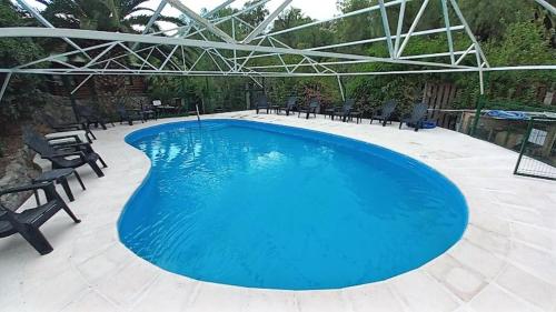 Kolam renang di atau dekat dengan Cabañas Pacari Tampu