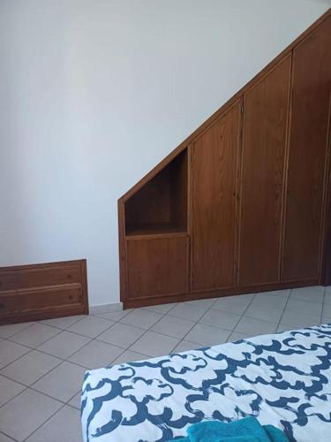 a bedroom with a bed and a tv in it at Campo del Gatto in Viterbo