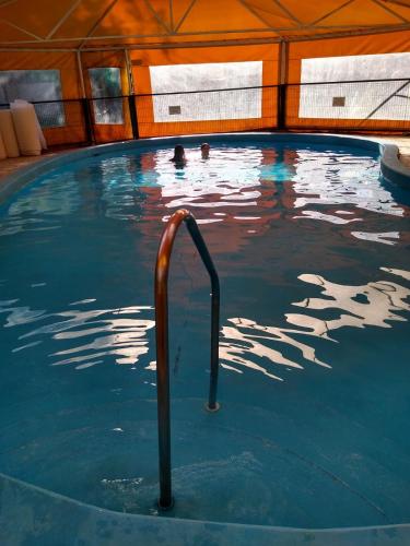 Kolam renang di atau dekat dengan Cabañas Pacari Tampu