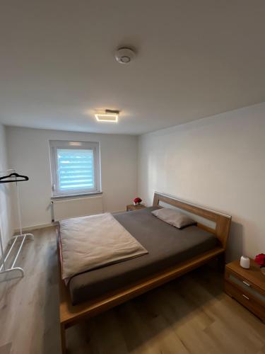 a bedroom with a large bed in a room at Ferienwohnung Laufenburg in Laufenburg