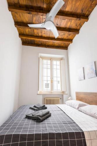Una cama o camas en una habitación de [Vista sulla Basilica]