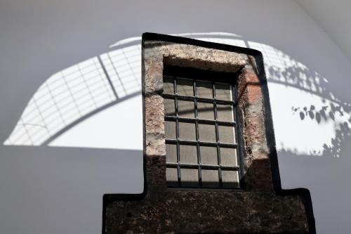 a window on top of a building with a snow covered at Villa Orpheus Santorini in Megalokhori