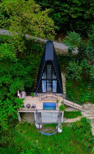 an overhead view of a backyard with a tent at N STORY in Keda