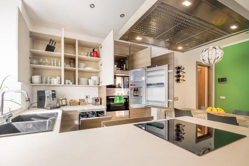a kitchen with a sink and a counter top at Luna Nuova in Tirano