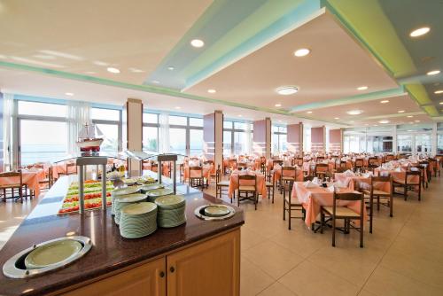 
A restaurant or other place to eat at Belair Beach Hotel
