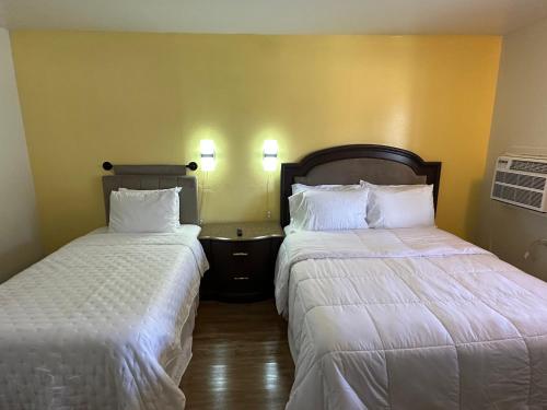 Letto o letti in una camera di Moapa Motel