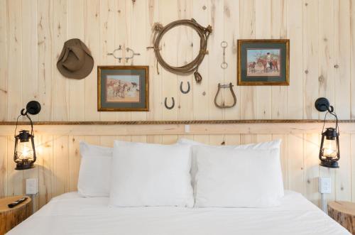 Ένα ή περισσότερα κρεβάτια σε δωμάτιο στο Hotel Palomino