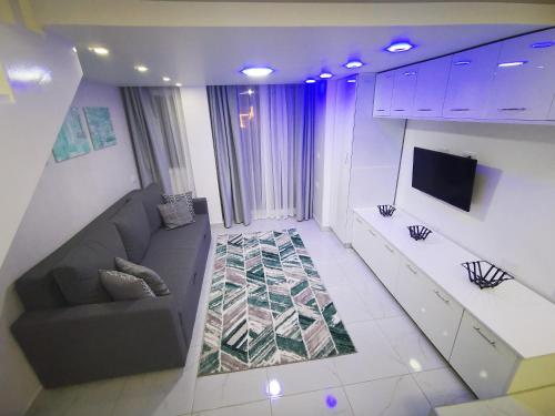 an overhead view of a living room with a couch at Loft VIP in Naama bey in Sharm El Sheikh