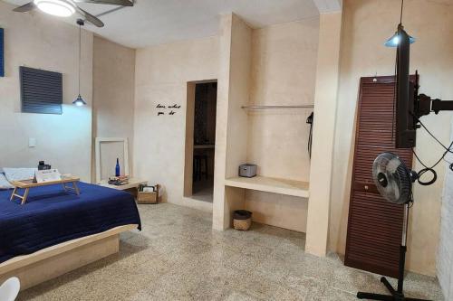Postel nebo postele na pokoji v ubytování Suite Stella Maris en el Centro Histórico Carmen
