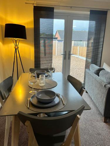 Posezení v ubytování Pinecone Cottage