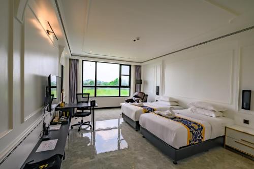 Postel nebo postele na pokoji v ubytování Hotel Seoul
