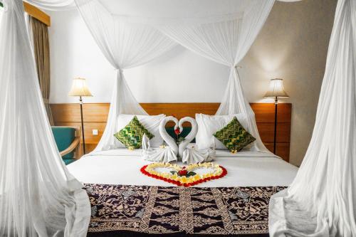 Postel nebo postele na pokoji v ubytování Sabana Ubud