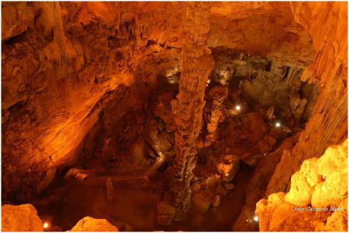 an overhead view of a cave with lights in it at Hotel Nettuno in Cala Gonone
