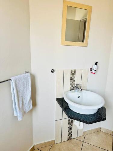 Ένα μπάνιο στο Warm Stay in an Estate pty Ltd