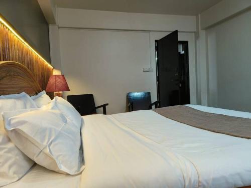 Red Panda Apartmentにあるベッド