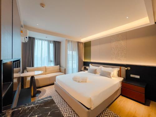 Katil atau katil-katil dalam bilik di Cha Chiangmai Luxury
