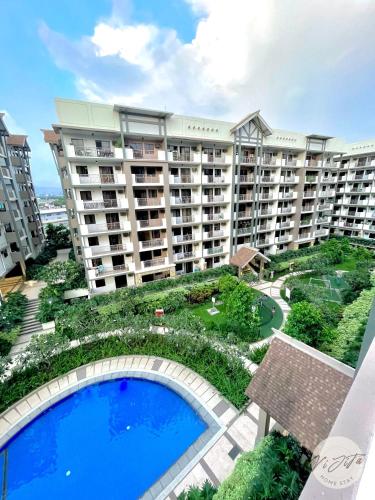 an overhead view of a large apartment complex with a swimming pool at Homestay by ViJiTa 2bedroom condo in Manila