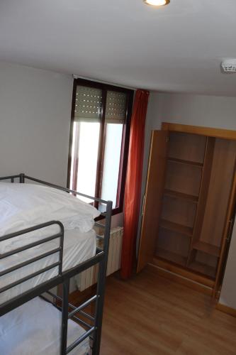 Postel nebo postele na pokoji v ubytování Mola! Hostel Burgos