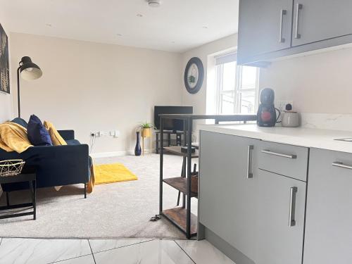 Η κουζίνα ή μικρή κουζίνα στο Newmarket - Suffolk Flat with Garden EV