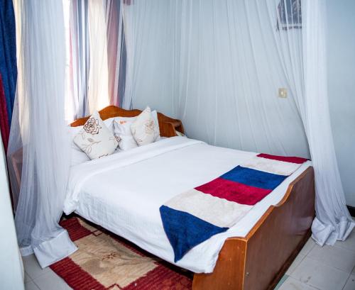 Postel nebo postele na pokoji v ubytování Jupiter Guest House - Parklands